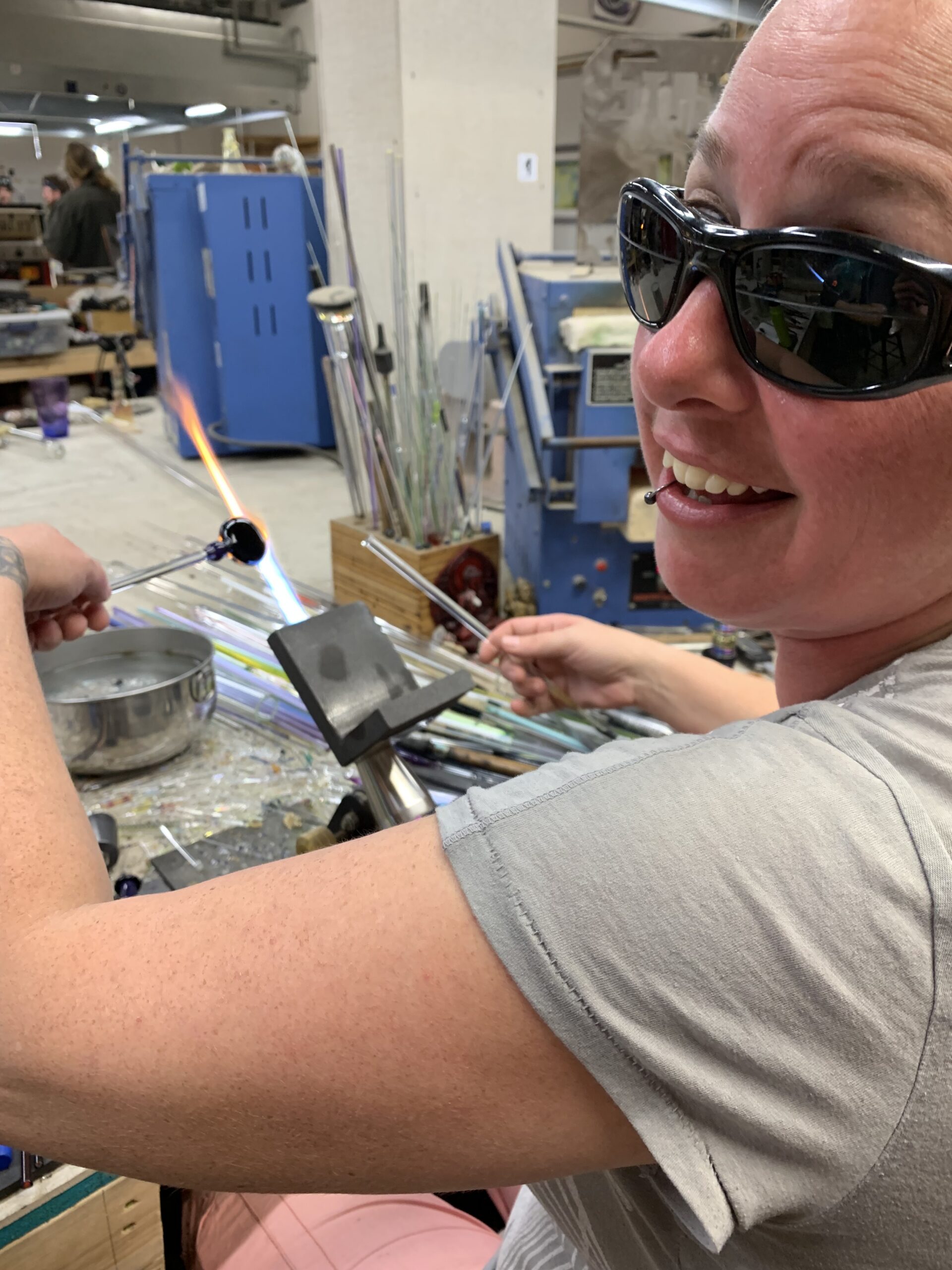 Erin Cartee, a Borosilicate Glass Artist making a Beads of Courage Power Pendant for AYA support
